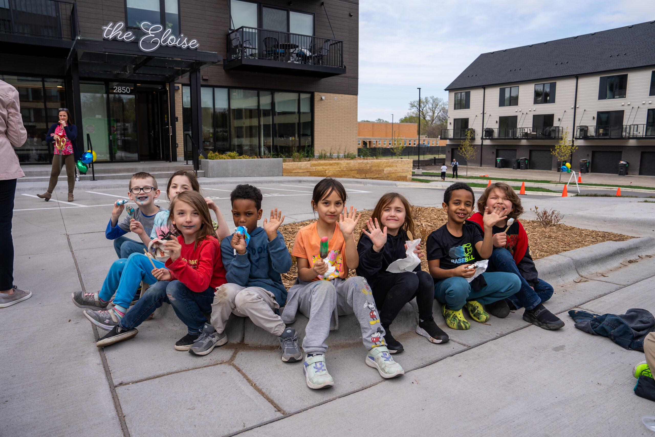 A group of children eats ice cream outside The Eloise